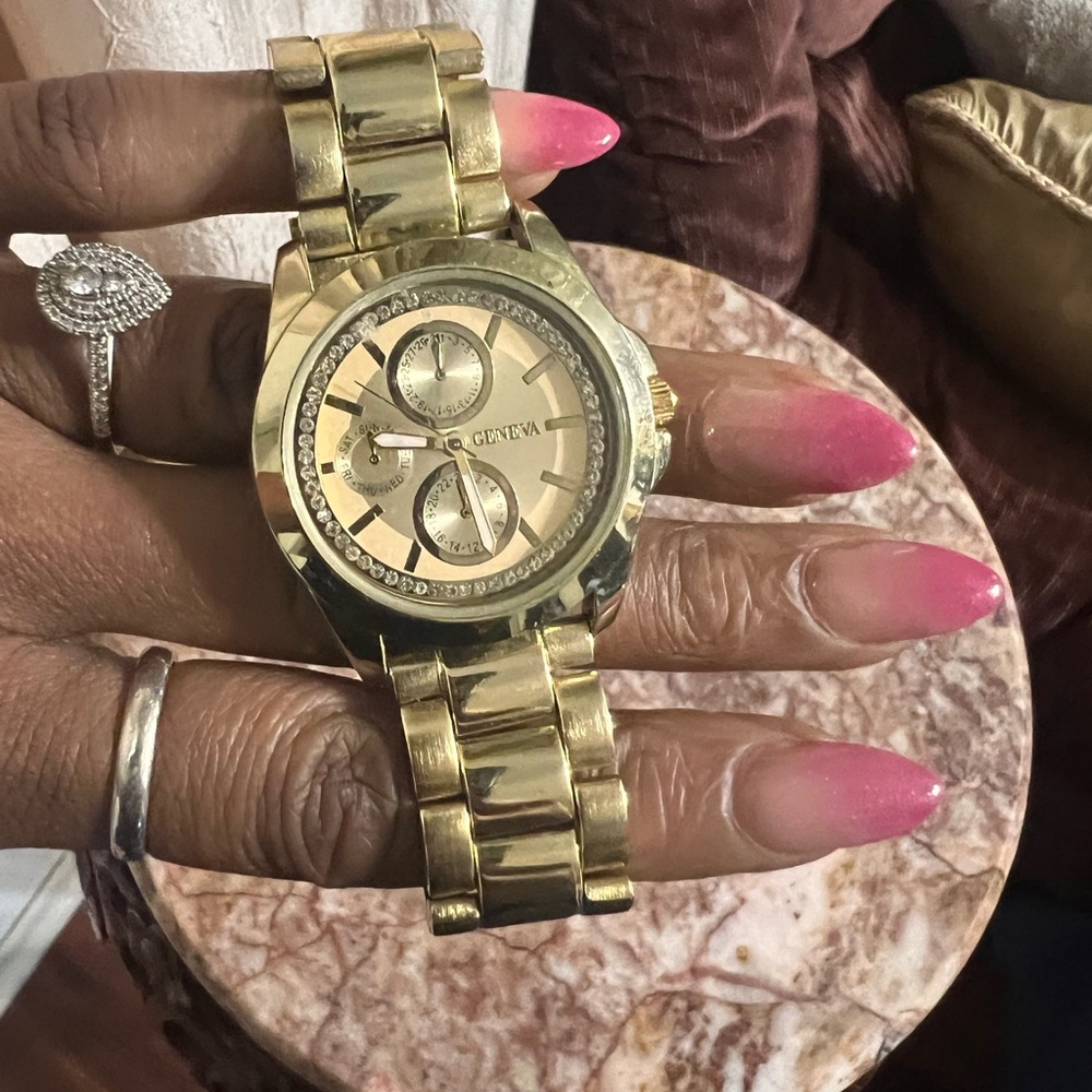Geneva gold watch